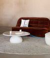 Vibe Sofa by Sancal in brown velvet with a white lounge chair – In Dubai by WSPR