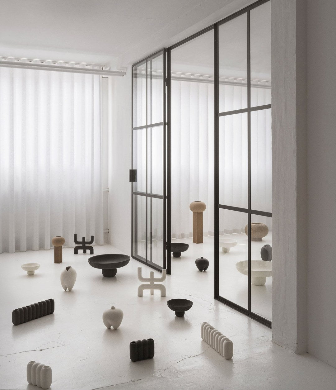 W Candle Holder by 101 Copenhagen in Bone White in a styled interior, view 3 – In Dubai by WSPR